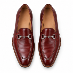 Burgundy leather horsebit loafers, top-down view