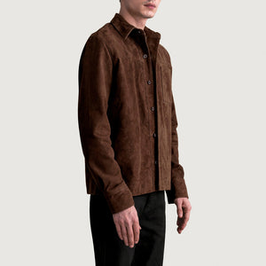 Side profile of a man wearing a men's mocha suede leather shirt jacket and black trousers.