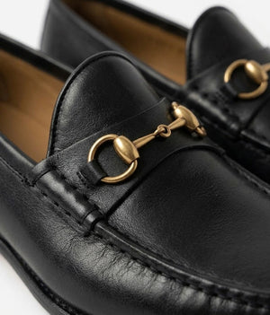 Side profile of Harmain Leathers Men's Black Leather Gold Bit Black Loafers, genuine leather craftsmanship