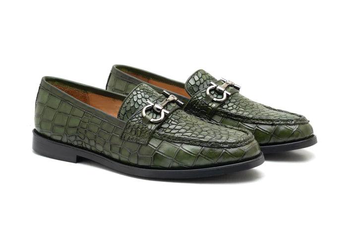Pair of men's green croc-embossed leather loafers with silver bit, three-quarter view