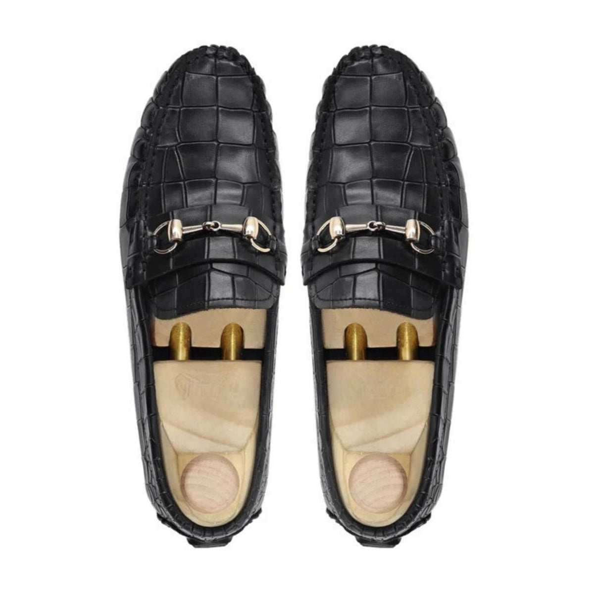 Black croc-embossed calf leather loafers with shoe trees, top-down view