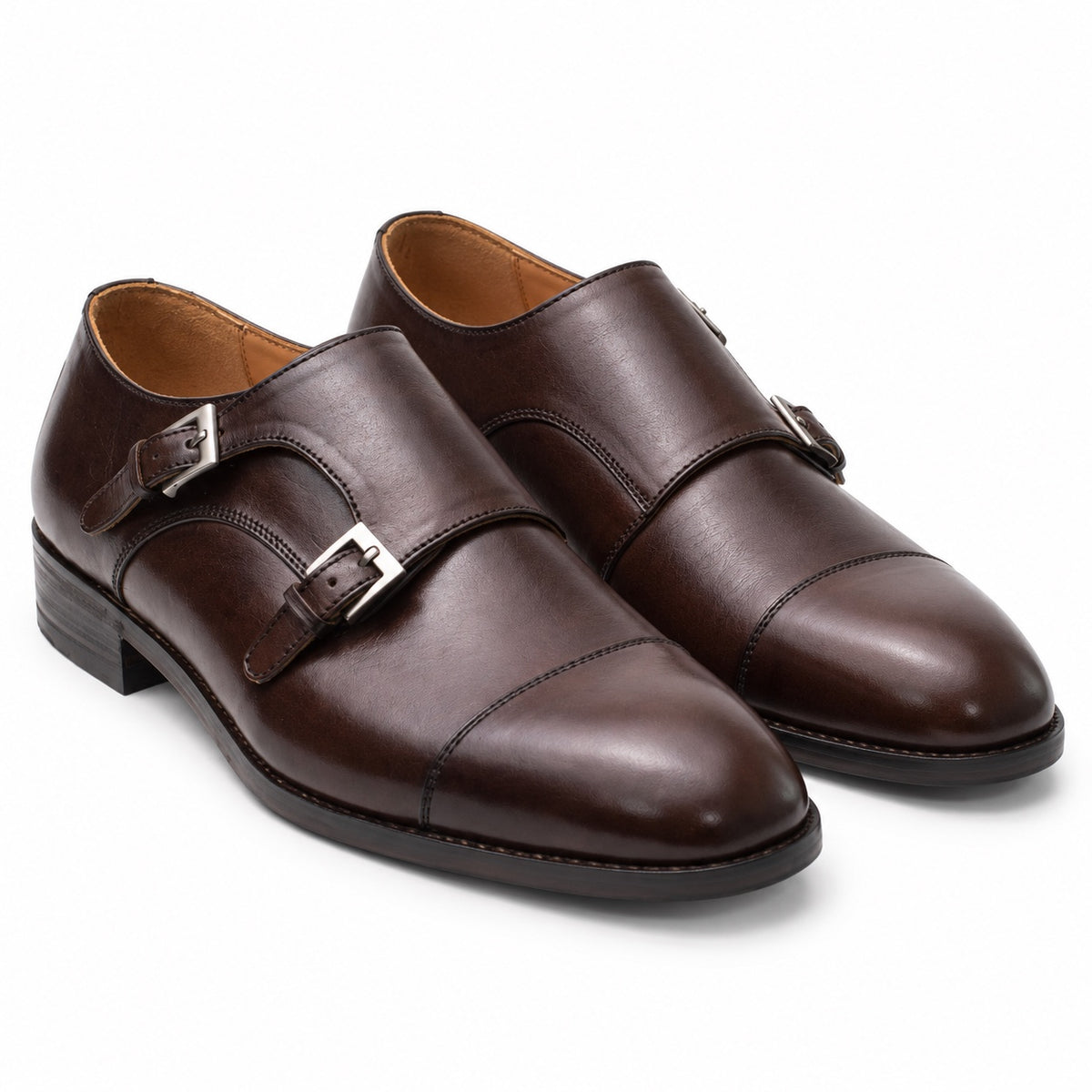 Pair of men's brown leather double monk strap shoes, three-quarter view